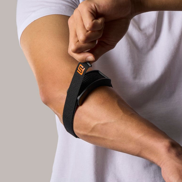 FICOR Active Elbow Stabilizer being adjusted – adjustable counterforce tennis elbow strap for targeted compression, easy-to-wear brace for tendonitis and forearm pain